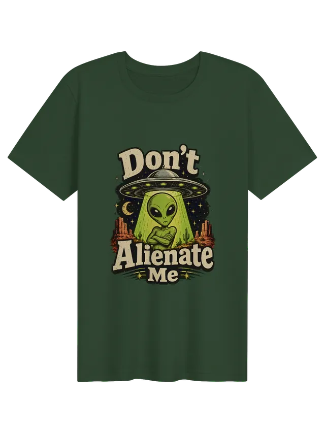 Don't Alienate Me tee in black with a pouting green alien under a UFO in the desert, by LOLsies